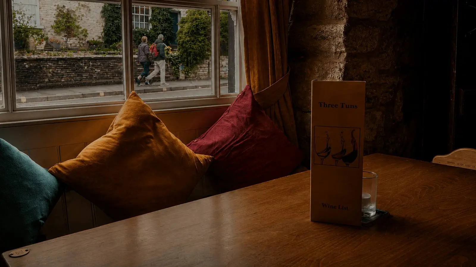 Cosy interior seating inside The Three Tuns